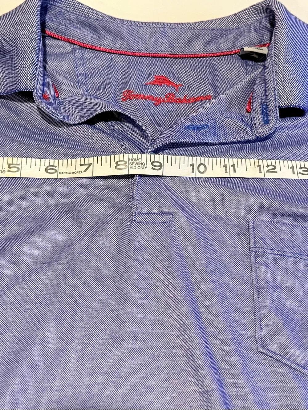Tommy Bahama Men's Blue Heather Polo Shirt with Chest Pocket. #0083